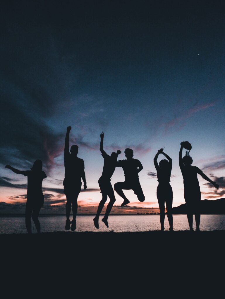 Sunset at the beach a a tour group enjoying themselves in Langkawi 