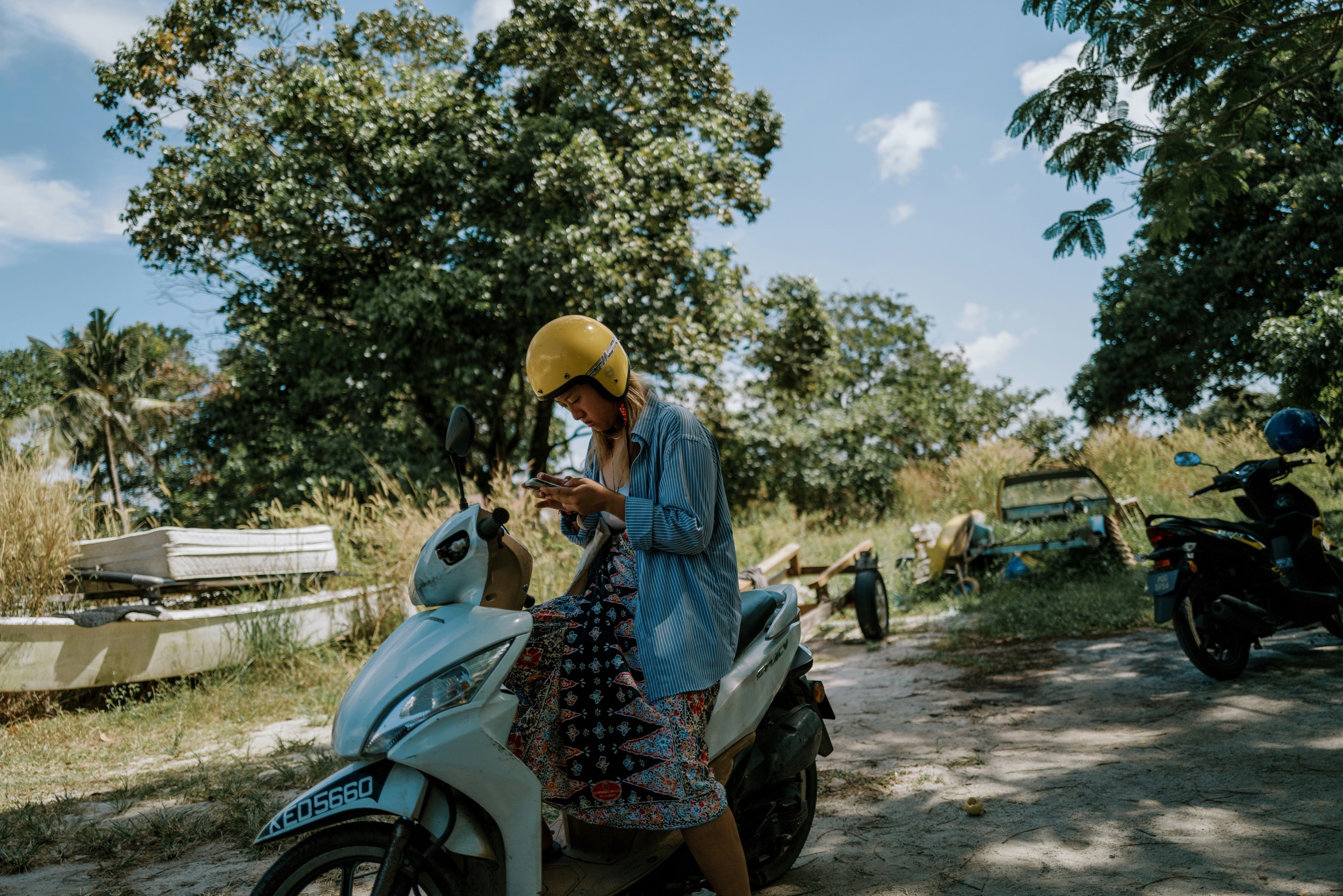 Girl on a scooter in Langkawi