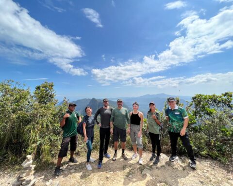 A tour group who have Trekked to the summit of Mount Matchincang Geoforest Park